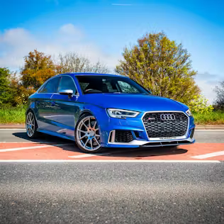 Win This Audi RS3 Saloon + £1,000 Cash!